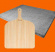 Pizzasten i lavasten från Etna 38x33 cm med brödspade i björkträ Eppicotispai Pizza set Pizzasten i lavasten från Etna 38x33 cm med brödspade i björkträ Eppicotispai Pizza set mot orange